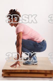 Kneeling pose blue jeans pink t shirt of Oxana …